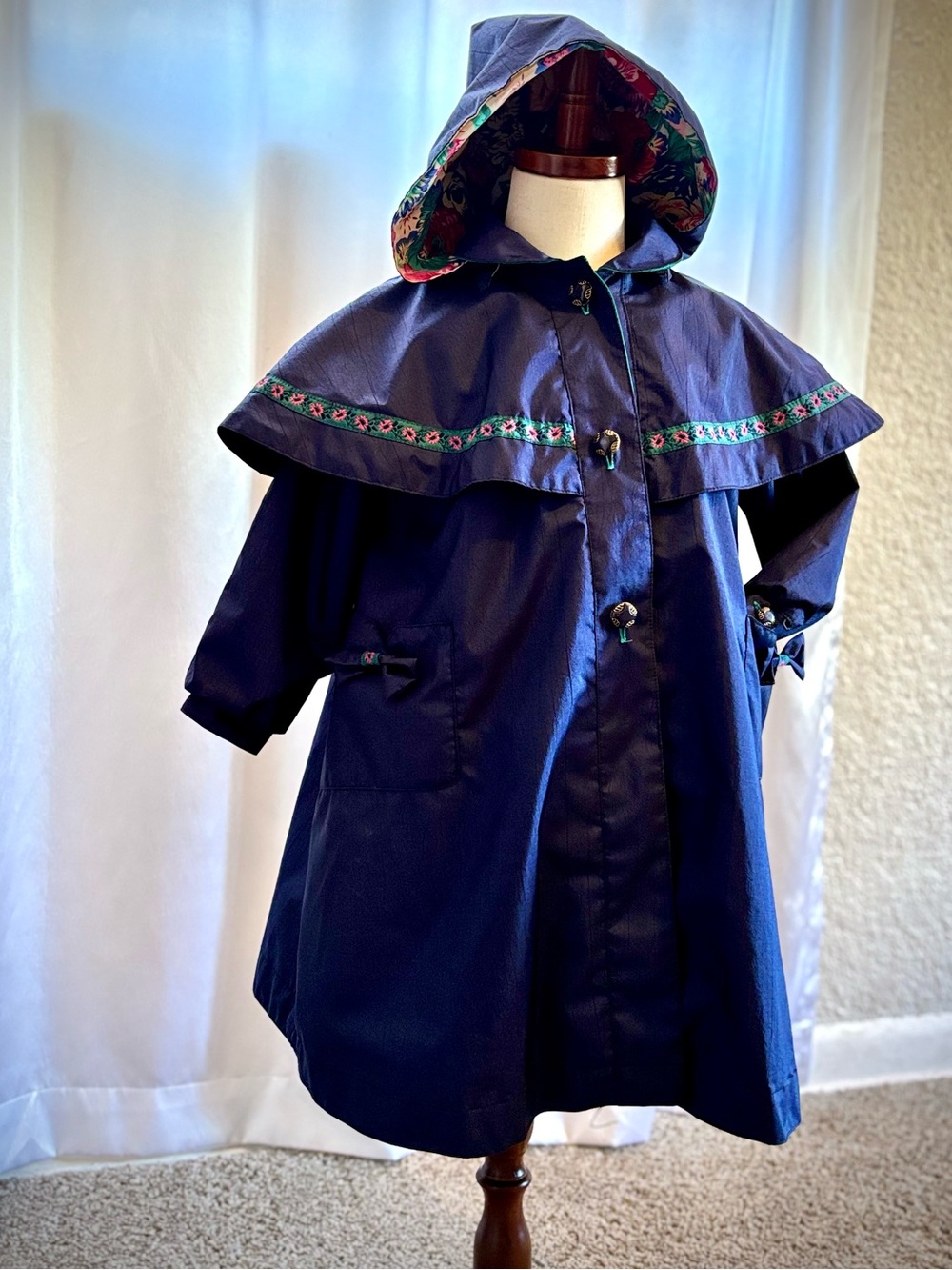 Rothschild Navy Rain Cape with Multicolor Floral Lining, with detachable hood.